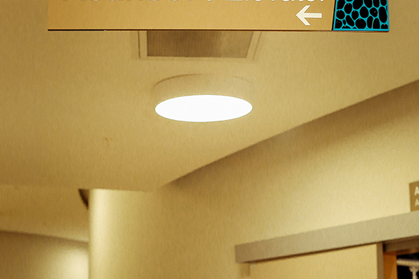 acrylic suspended directional sign	