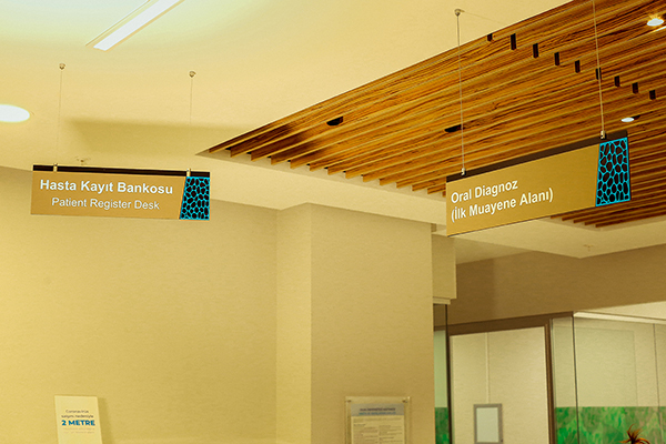 acrylic suspended directional sign	