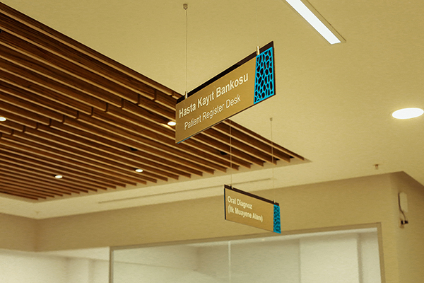 acrylic suspended directional sign	