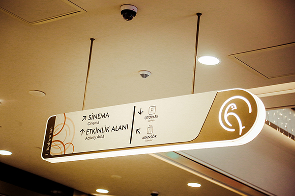 aluminum illuminated suspended directional sign	