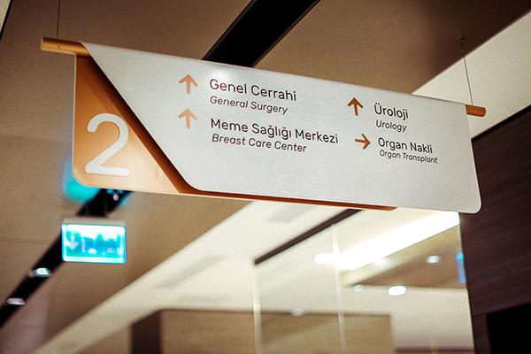 aluminum suspended directional hospital sign	