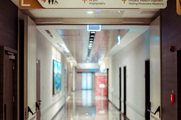 aluminum suspended directional hospital sign	