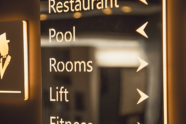 illuminated staninless steel floor information, directional signage